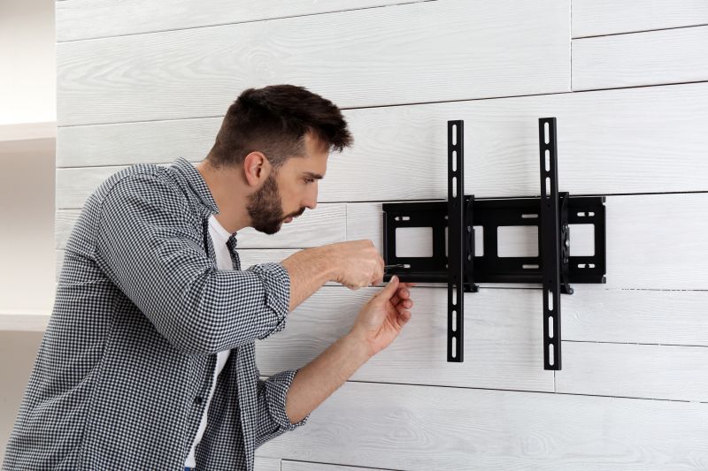 Handyman Installing Shelves